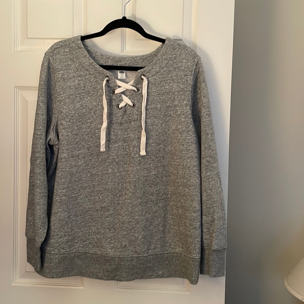 Practically new grey sweatshirt with laced closure